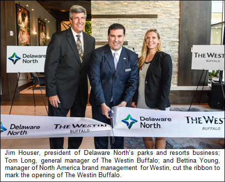 Jim Houser, president of Delaware North's parks and resorts business; Tom Long, general manager of The Westin Buffalo; and Bettina Young, manager of North America brand management for Westin, cut the ribbon to mark the opening of The Westin Buffalo.