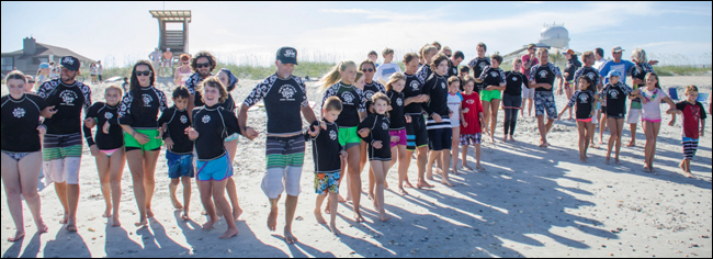 Jack Viorel leading Visually Impaired Surf Camp at Wrightsville Beach (Courtesy of NCPressRelease)