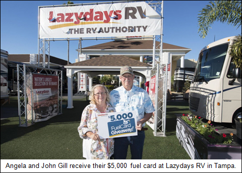 Angela and John Gill receive their $5,000 fuel card at Lazydays RV in Tampa