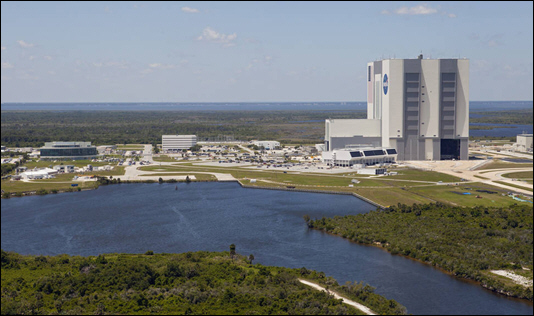 The Vehicle Assembly Building at NASA's Kennedy Space Center in Florida is a unique facility capable of stacking rockets as high as 450 feet tall using its 325-ton cranes. (Credit: NASA)