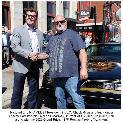Pictured L-to-R: AMBEST President & CEO, Chuck Ryan and truck driver Stacey Hamilton pictured on Broadway, in front of Ole Red (Nashville, TN) along with the 2023 Grand Prize, 1978 Pontiac Firebird Trans Am.