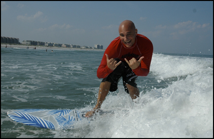 Rick Civelli surfing ~ building community, raising awareness, and having fun!