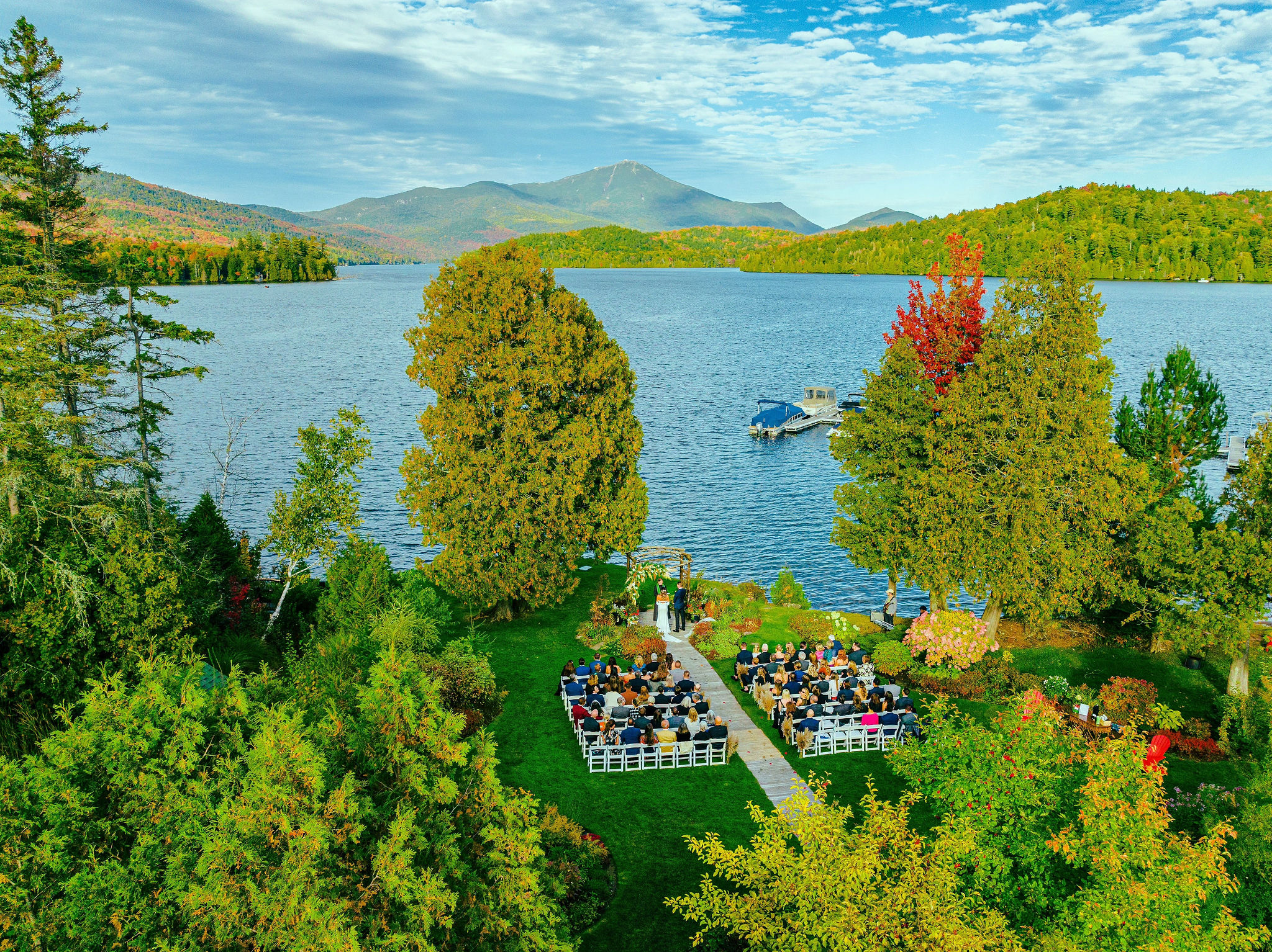 Photo credit: Jordan Craig Media LLC / Whiteface Club wedding gardens with Lake Placid and Whiteface Mountain among the witnesses